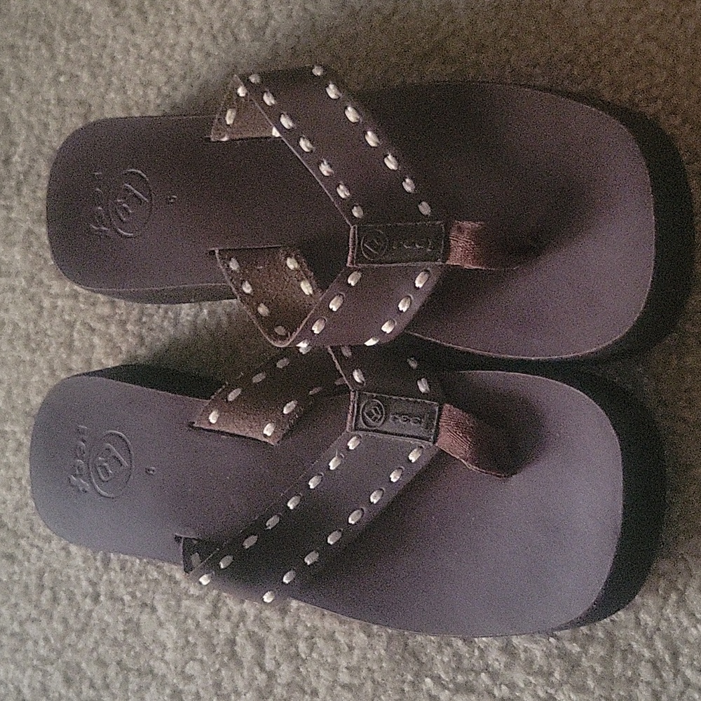 Like new Reef wedge flip flop leather with white stitching